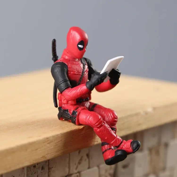 Figura de acción de Anime Deadpool, modelo de postura sentada, x-men, Mini muñeca, decoración, colección de plástico, estatuilla, juguete para niños, regalo