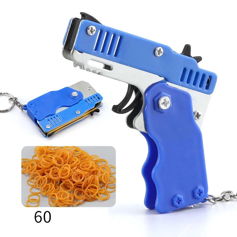 Wholesale Mini Rubber Bands Shoot Gun Alloy Metal Gun Pistol Plastic Key Chain Collapsible Funny Gun Toys For Kids