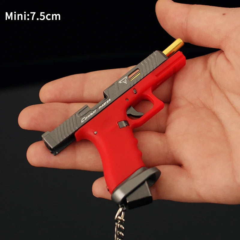 7.5CM TTIG34 Factory Price Alloy Empire Metal Mini Gun Model Keychain Shell Ejecting Black Toy Gun