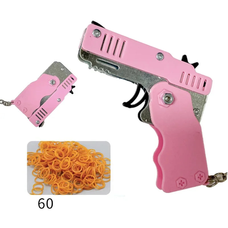 Wholesale Mini Rubber Bands Shoot Gun Alloy Metal Gun Pistol Plastic Key Chain Collapsible Funny Gun Toys For Kids