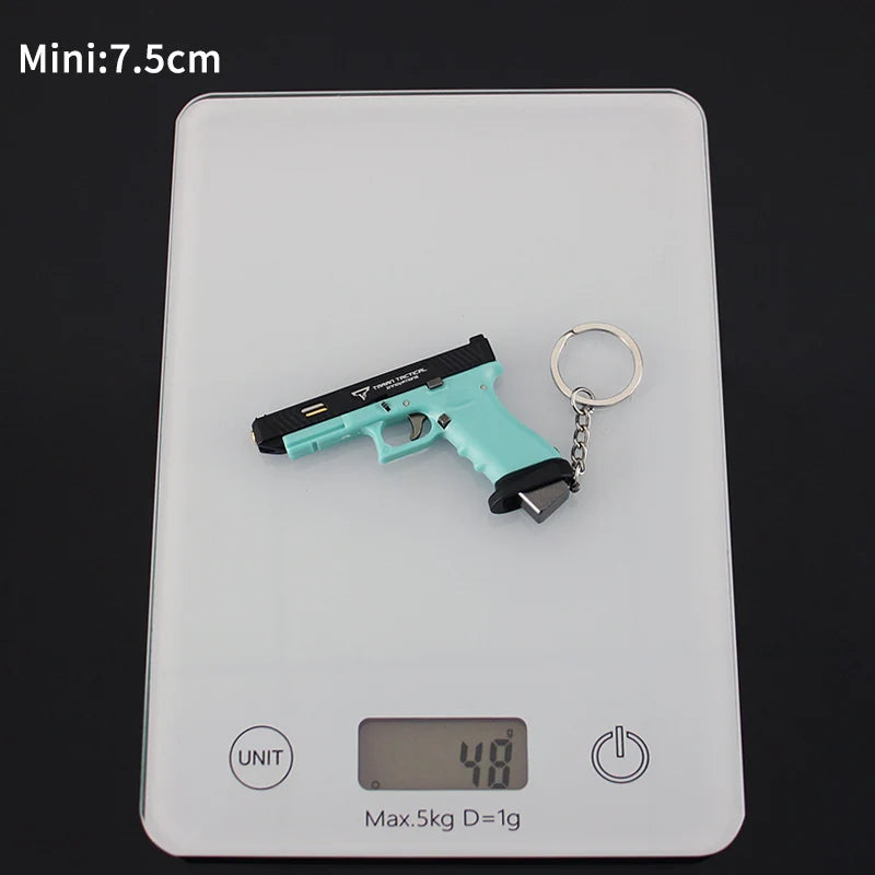 7.5CM TTIG34 Factory Price Alloy Empire Metal Mini Gun Model Keychain Shell Ejecting Black Toy Gun