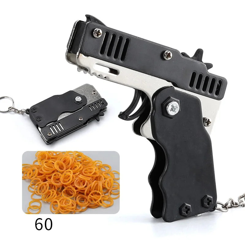 Wholesale Mini Rubber Bands Shoot Gun Alloy Metal Gun Pistol Plastic Key Chain Collapsible Funny Gun Toys For Kids